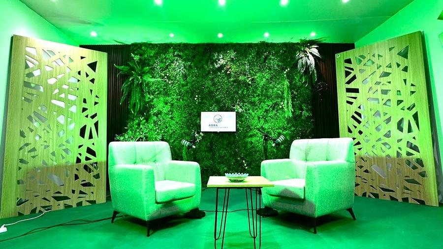 AGRA podcast set with a green living wall in Dakar