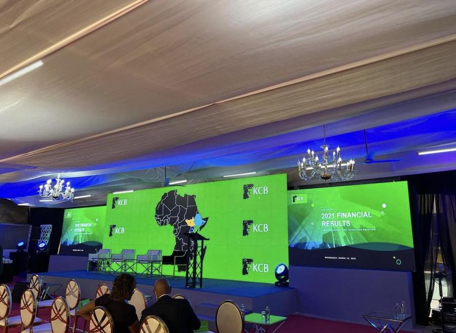 KCB Group financial results briefing stage with LED screens
